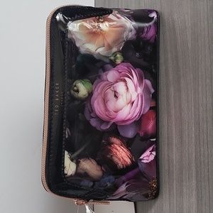 Ted Baker Small Black w/colorful Flowers Makeup Bag.
